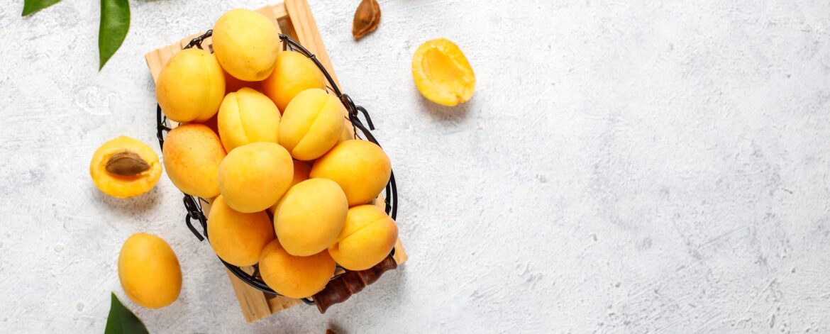 Fresh organic apricots,summer fruit,top view Fresh organic apricots,summer fruit,top view